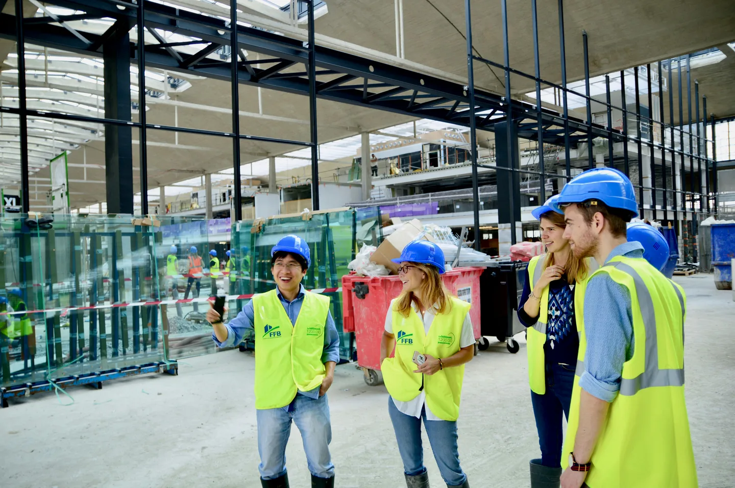 Workers in positive safety meeting or coaching session